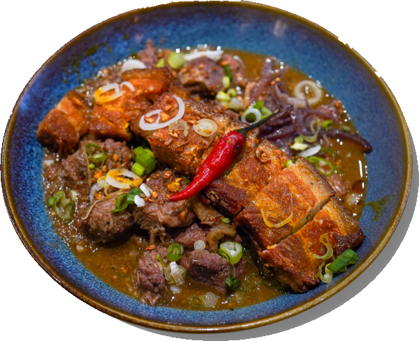 Pata Hamonado — braised pork on a blue plate